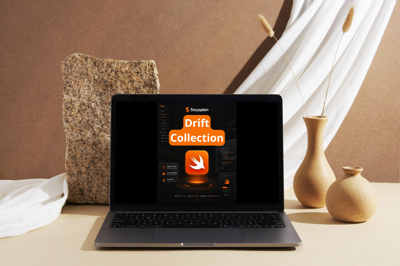 Laptop displaying 'Drift Collection' on a table with decorative vases and a stone block.